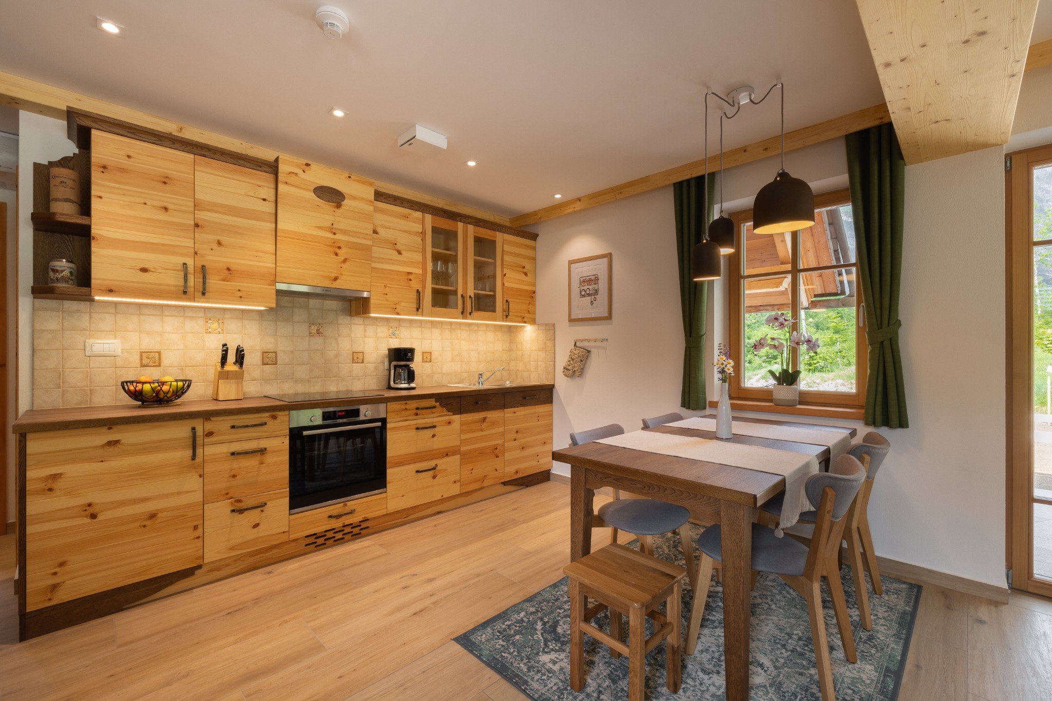 Kitchen and dining area in the Alpine SPA Chalet, Bohinj.