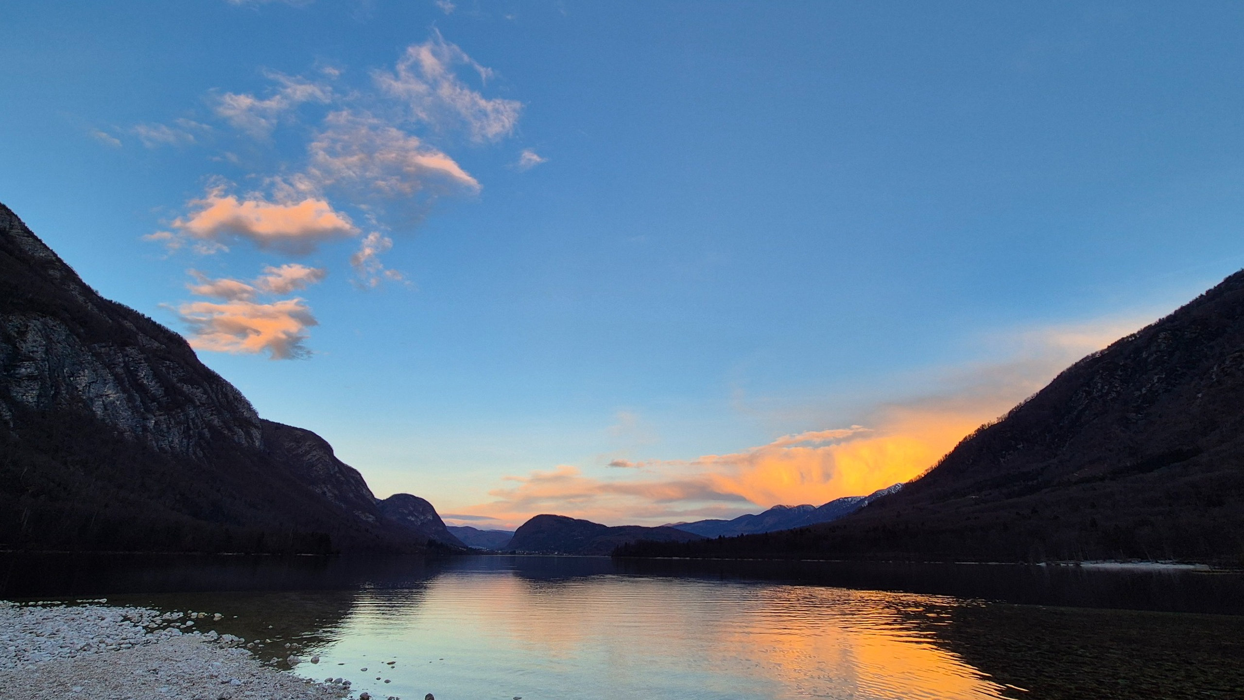 Sunset reflections over Lake Bohinj in Triglav National Park near Alpine SPA Chalet.