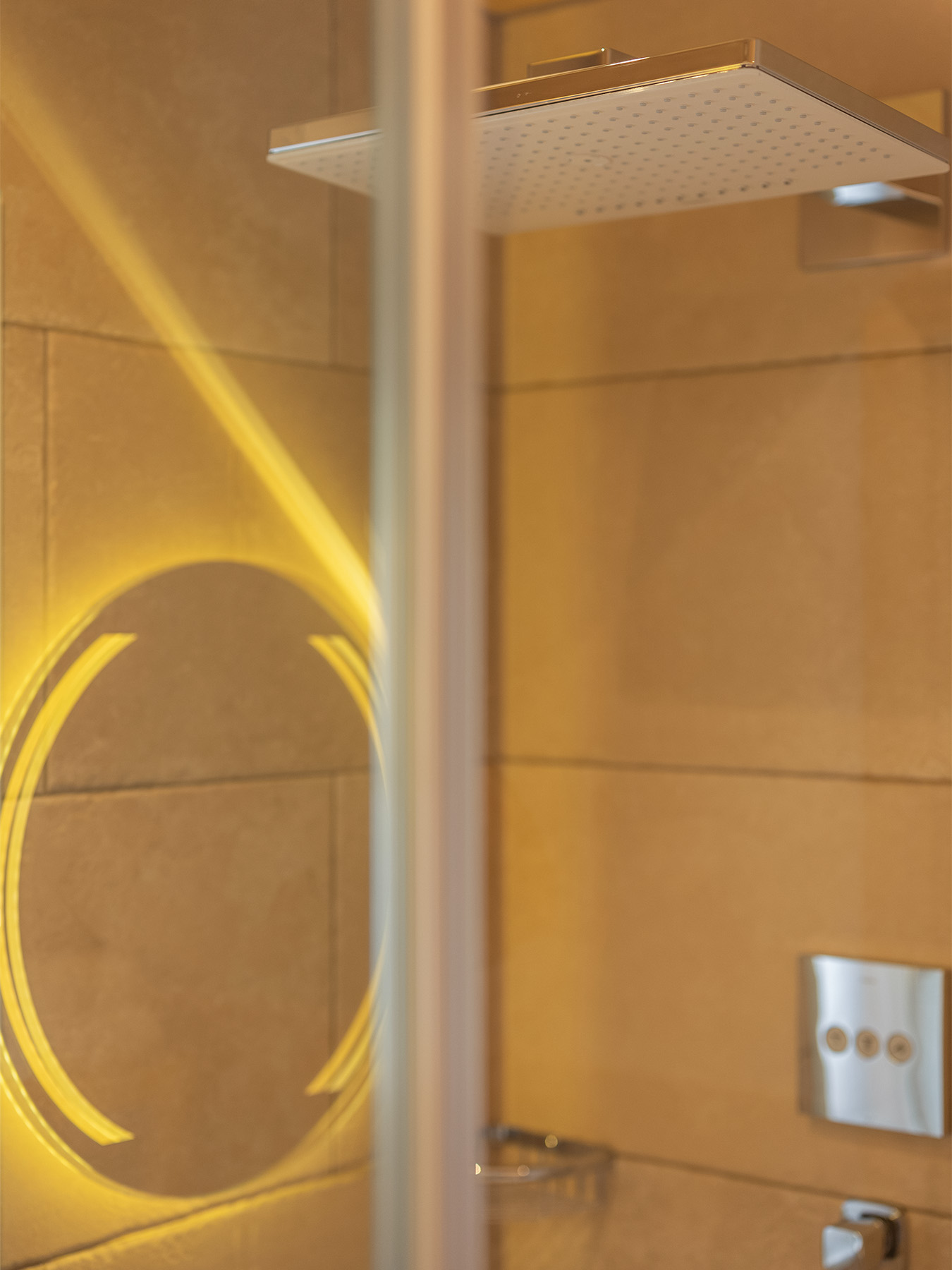 Rain-style massage shower detail in the private wellness area of an Alpine SPA Chalet by Lake Bohinj.